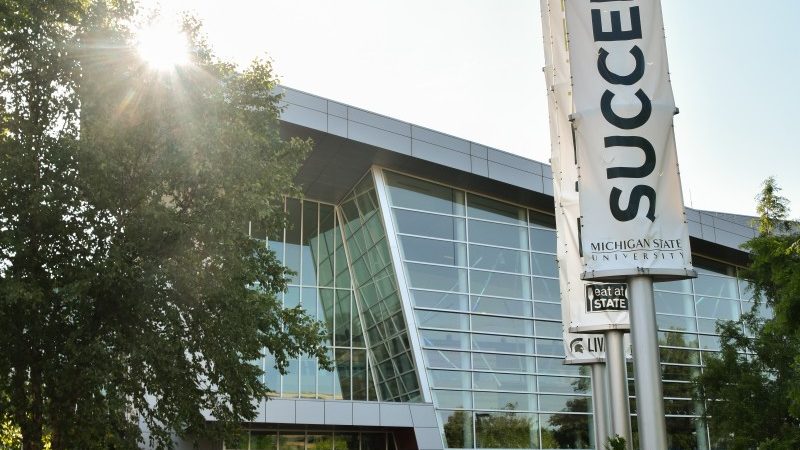 brody hall with succeed here sign
