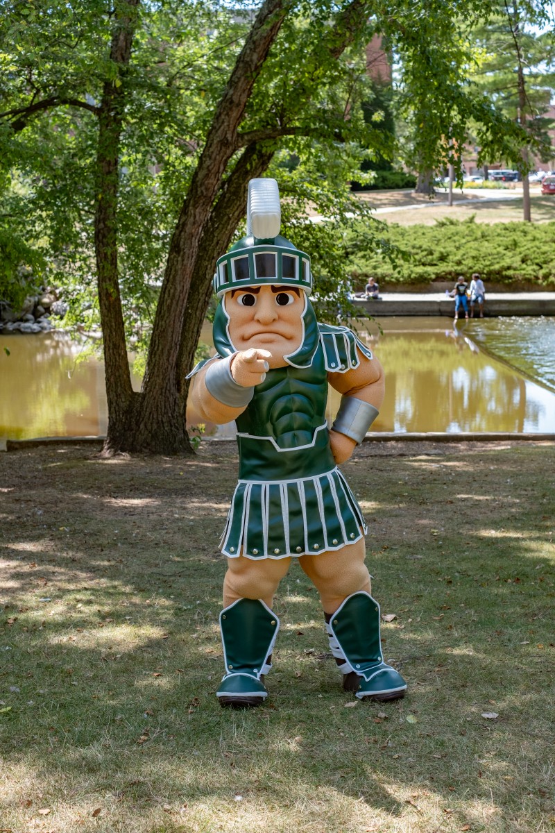 Sparty mascot pointing at the screen